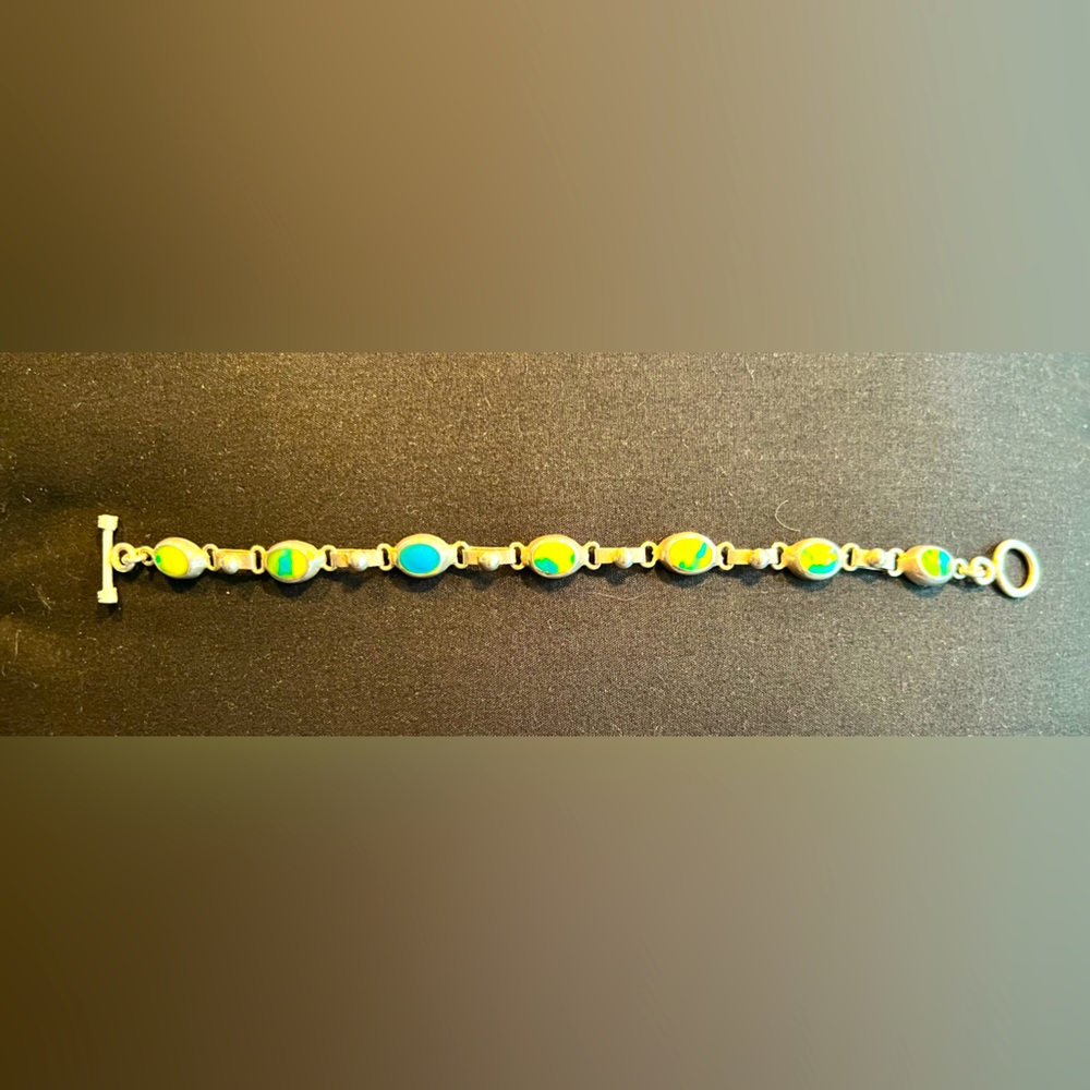Silver (9.25) toggle closure bracelet - blue, green & yellow accent stones.